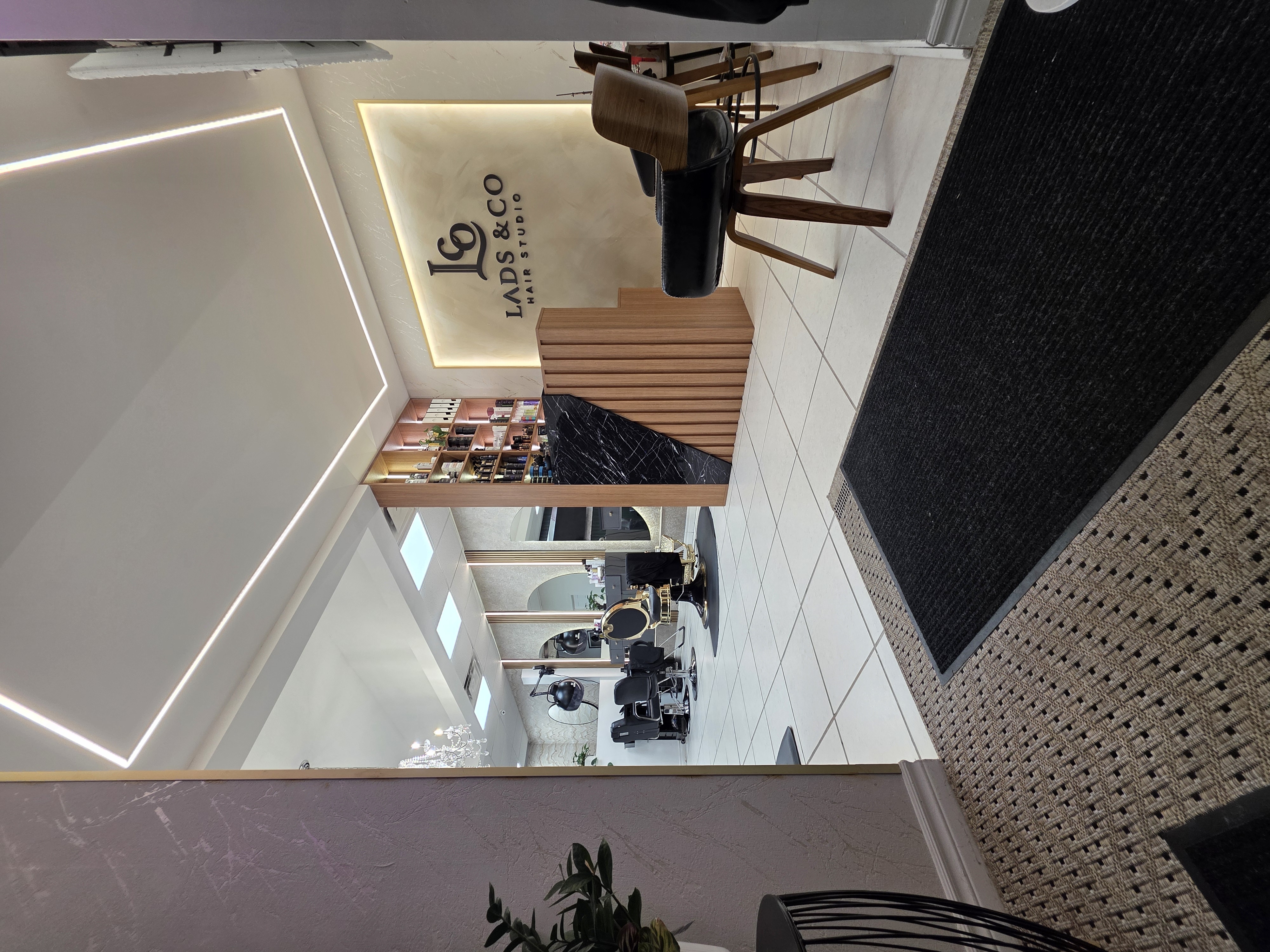 Lads & Co studio entrance and branded interior in Whitby
